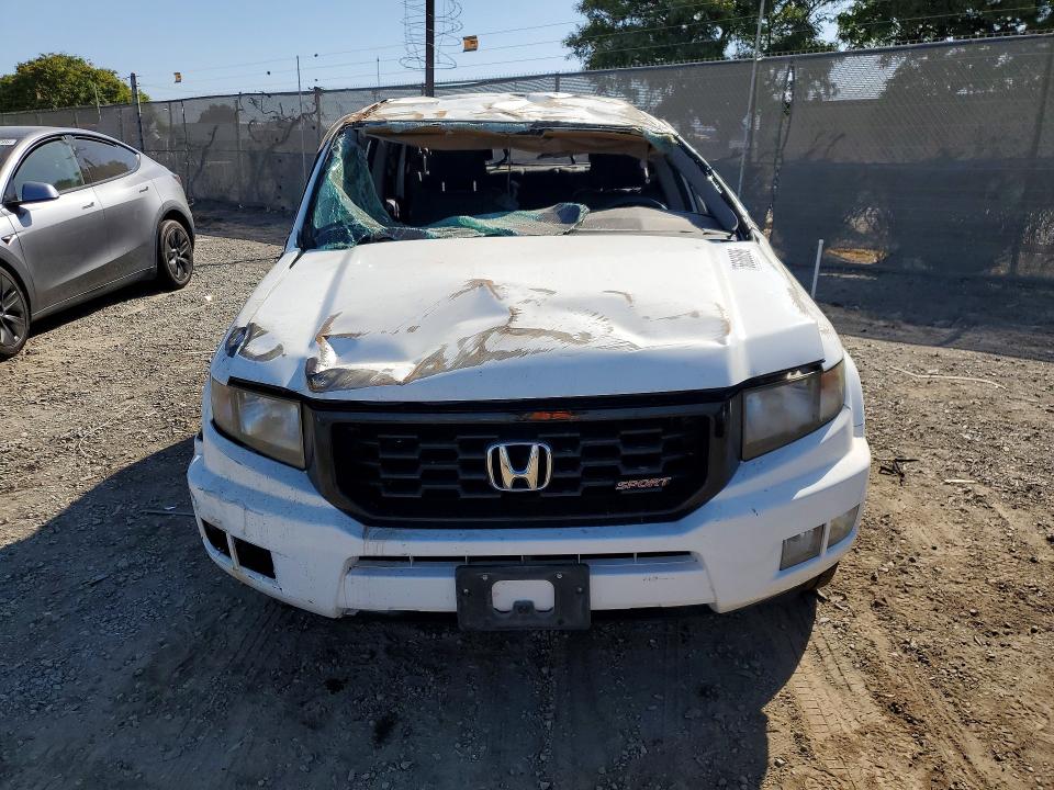 Photo 5 from auction – 2013 HONDA RIDGELINE with VIN 5FPYK1F70DB012736