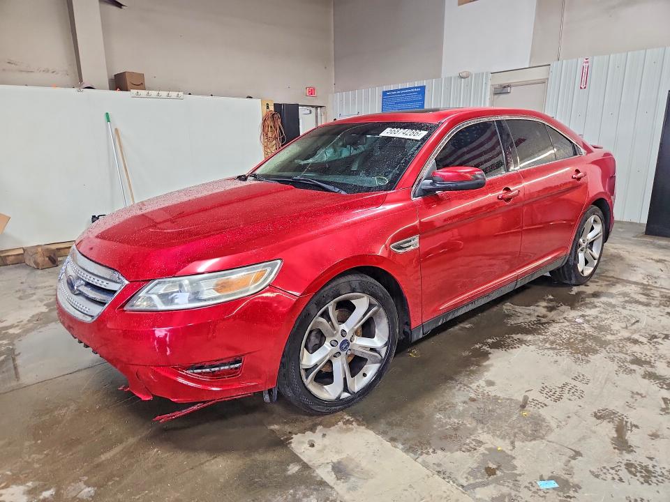 FORD TAURUS 2010 with VIN 1FAHP2KT8AG123643 - Photo from auction