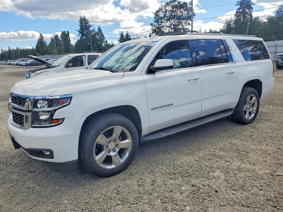 CHEVROLET SUBURBAN 2017 with VIN 1GNSKHKCXHR141018 - Photo from auction