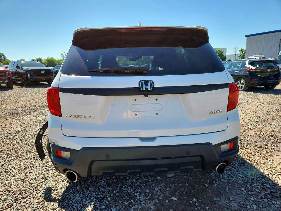 Photo 6 from auction – 2023 HONDA PASSPORT with VIN 5FNYF8H57PB002758