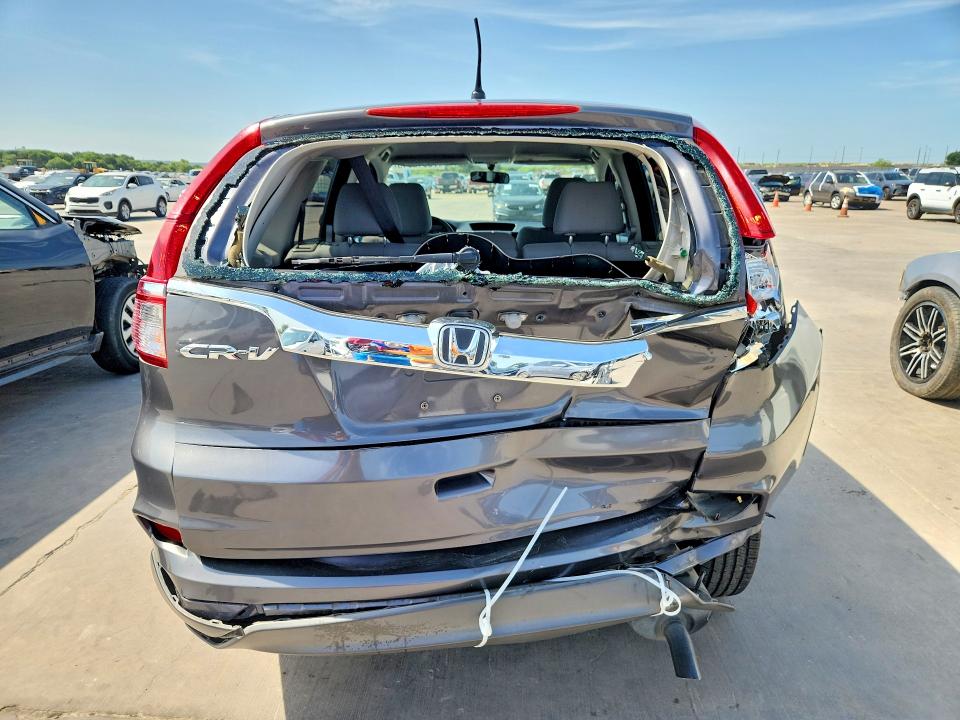 Photo 6 from auction – 2015 HONDA CR-V with VIN 3CZRM3H36FG710465