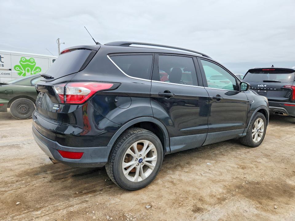 Photo 3 from auction – 2018 FORD ESCAPE with VIN 1FMCU9HD8JUB86714