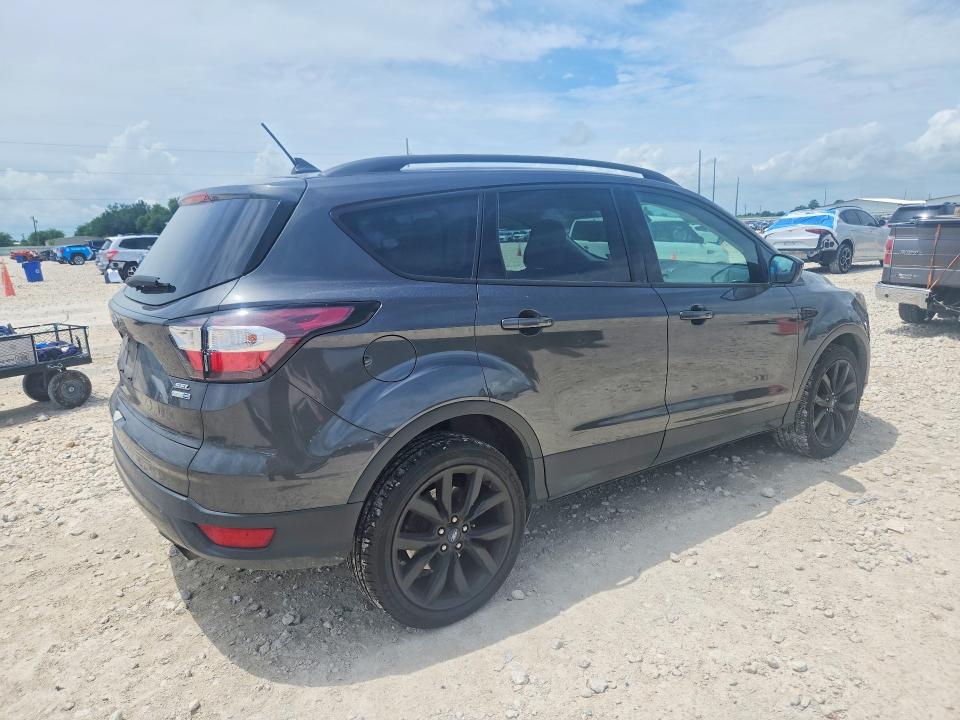 Photo 3 from auction – 2018 FORD ESCAPE with VIN 1FMCU9HD4JUC98149