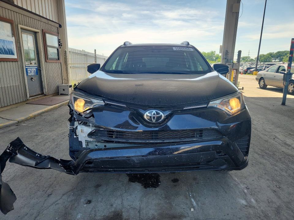 Photo 5 from auction – 2018 TOYOTA RAV4 with VIN 2T3BFREV7JW769902