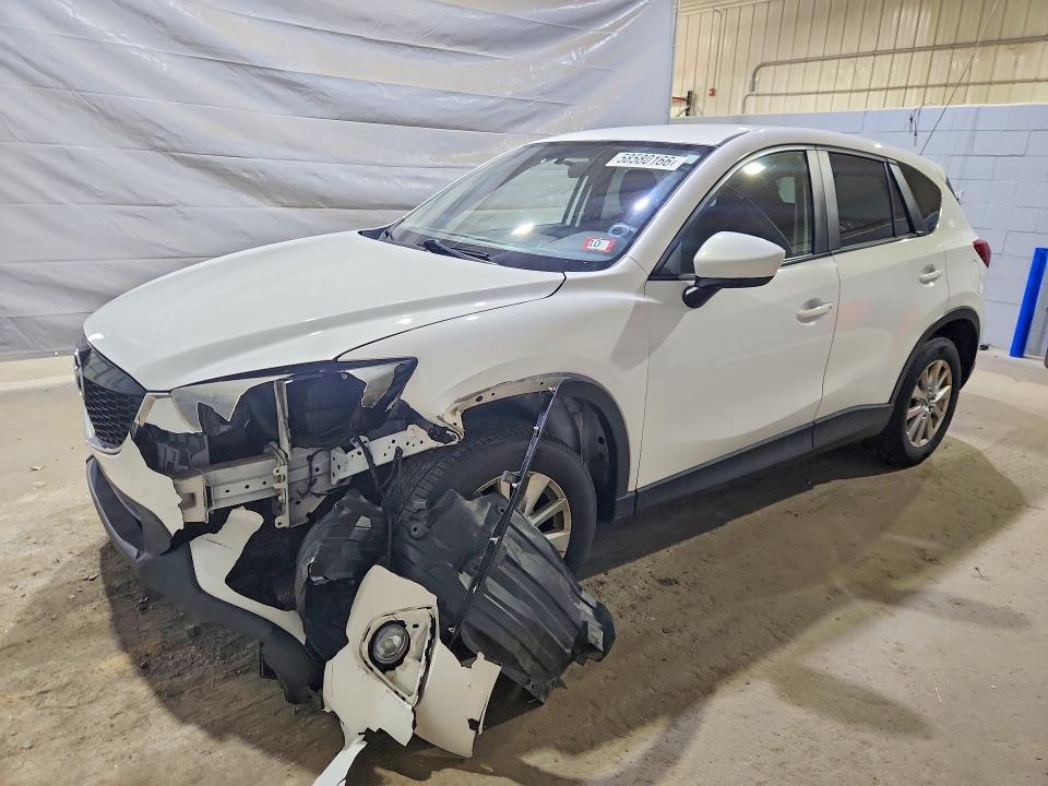 MAZDA CX-5 2014 with VIN JM3KE4CYXE0395791 - Photo from auction
