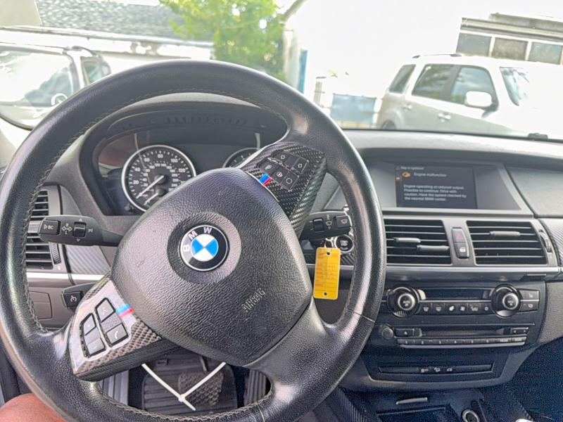 Photo 9 from auction – 2011 BMW X5 with VIN 5UXZV4C56BL408820
