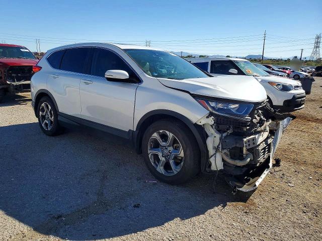 Photo 4 from auction – 2019 HONDA CR-V with VIN 5J6RW1H82KA041789