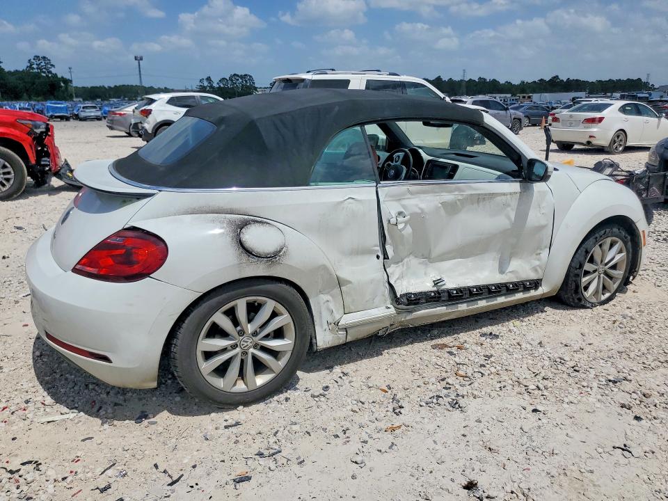 Photo 3 from auction – 2017 VOLKSWAGEN BEETLE with VIN 3VW517AT8HM814665