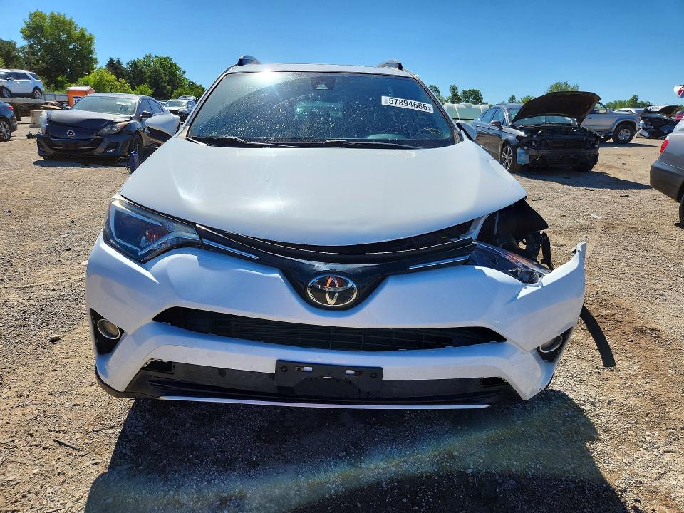 Photo 5 from auction – 2018 TOYOTA RAV4 with VIN JTMRFREV6JD251677