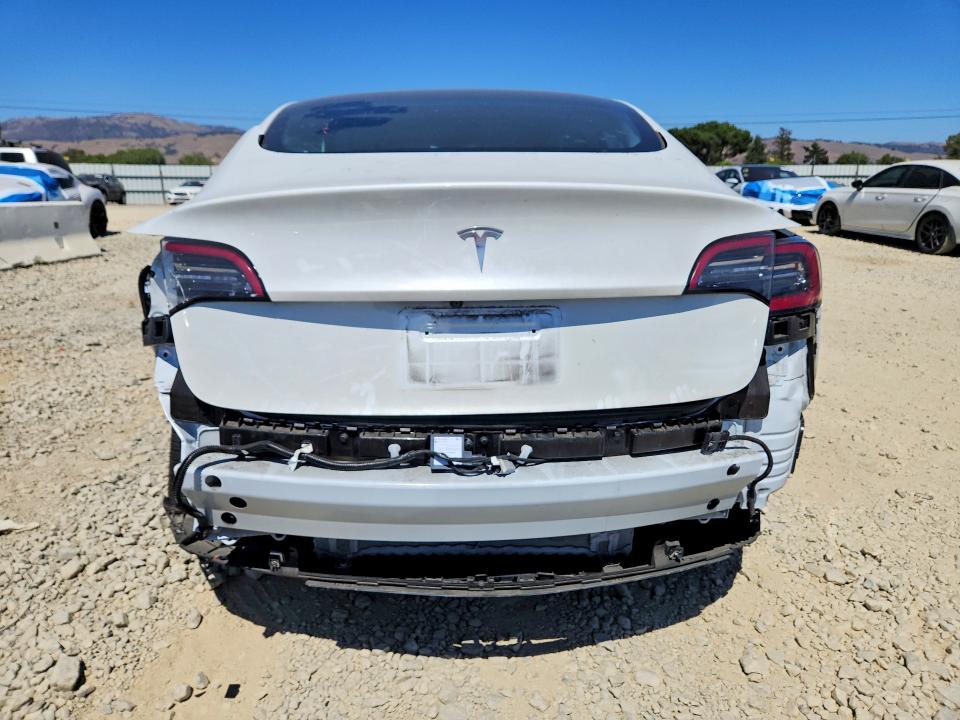 Photo 6 from auction – 2023 TESLA MODEL 3 with VIN 5YJ3E1EA1PF577735