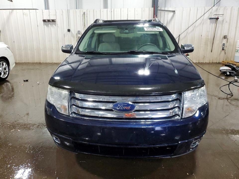 Photo 5 from auction – 2008 FORD TAURUS X with VIN 1FMDK06W28GA30221