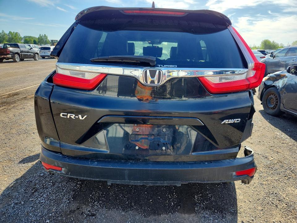 Photo 6 from auction – 2018 HONDA CR-V with VIN 2HKRW2H20JH113765