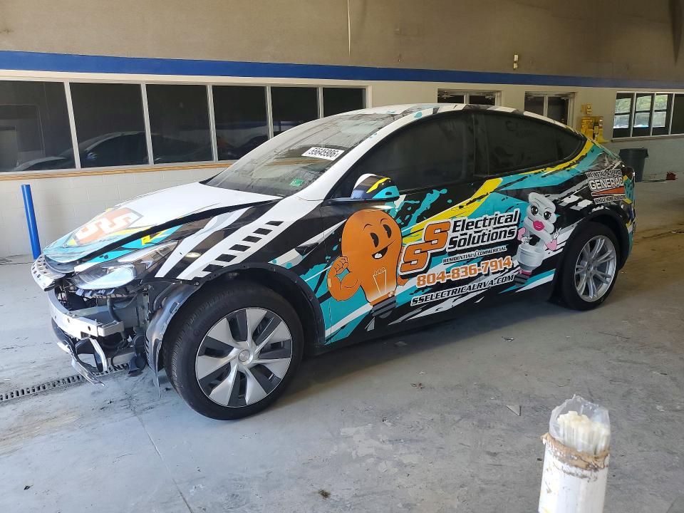 TESLA MODEL Y 2023 with VIN 7SAYGDED2PF940185 - Photo from auction