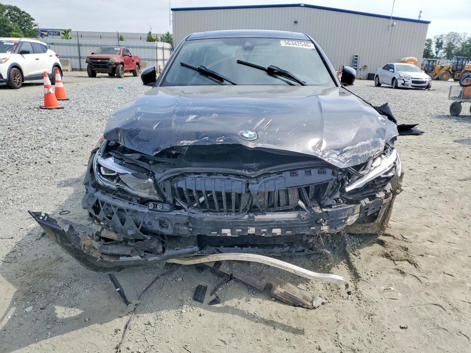 Photo 5 from auction – 2021 BMW 330I with VIN 3MW5R1J09M8C21220