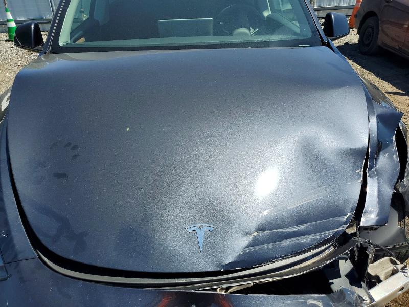 Photo 11 from auction – 2024 TESLA MODEL Y with VIN 7SAYGDEE6RA321484