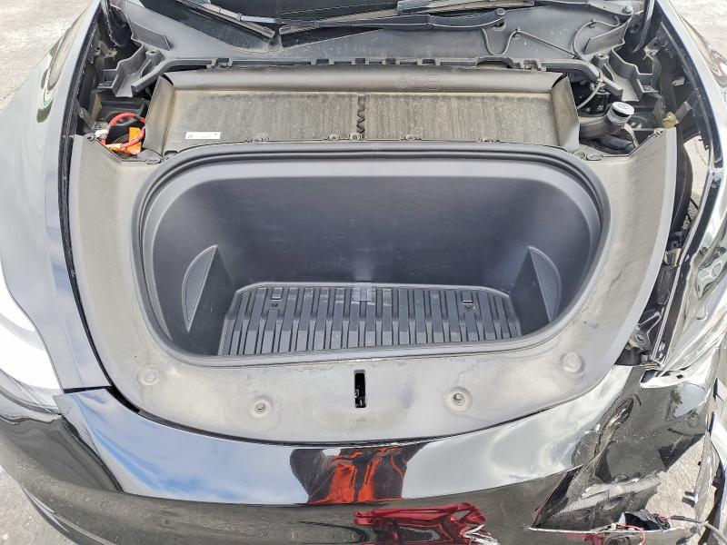 Photo 11 from auction – 2023 TESLA MODEL Y with VIN 7SAYGDEE6PA114719