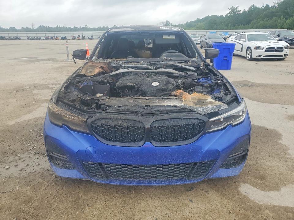 Photo 5 from auction – 2019 BMW 330I with VIN WBA5R1C58KAK07979