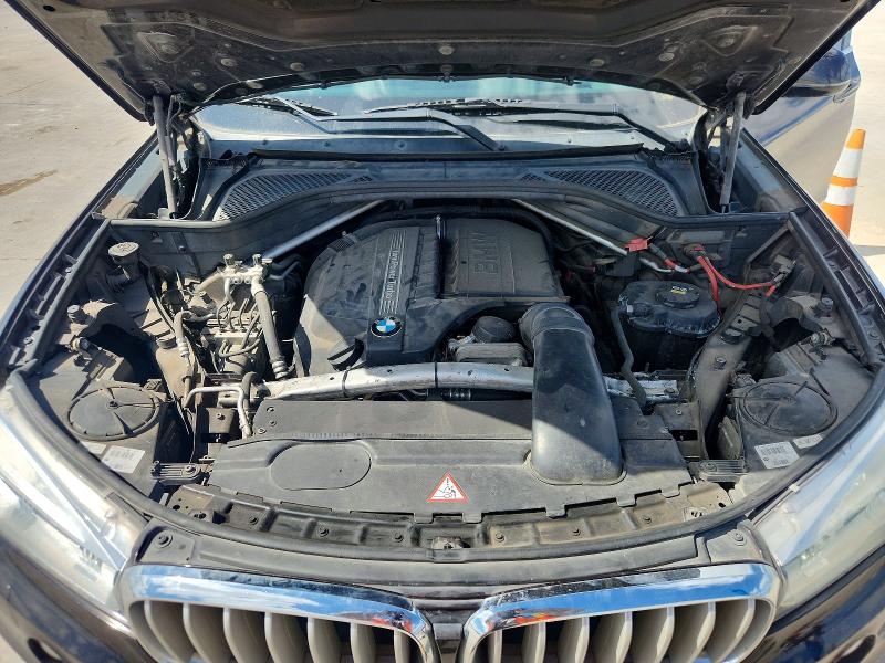 Photo 12 from auction – 2015 BMW X5 with VIN 5UXKR0C5XF0K57972