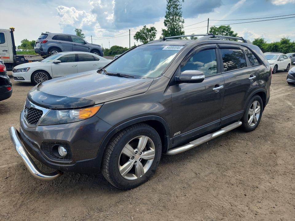 KIA SORENTO 2012 with VIN 5XYKUDA20CG300267 - Photo from auction
