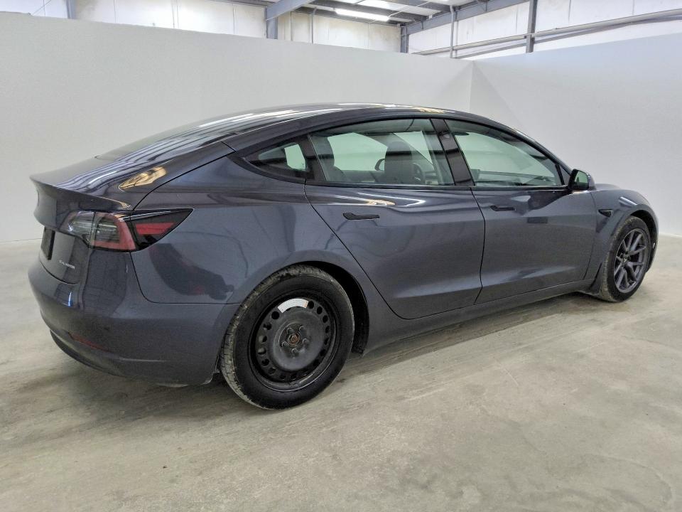 Photo 3 from auction – 2021 TESLA MODEL 3 with VIN 5YJ3E1EB5MF979066