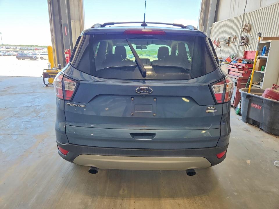 Photo 6 from auction – 2018 FORD ESCAPE with VIN 1FMCU9HD5JUC59635