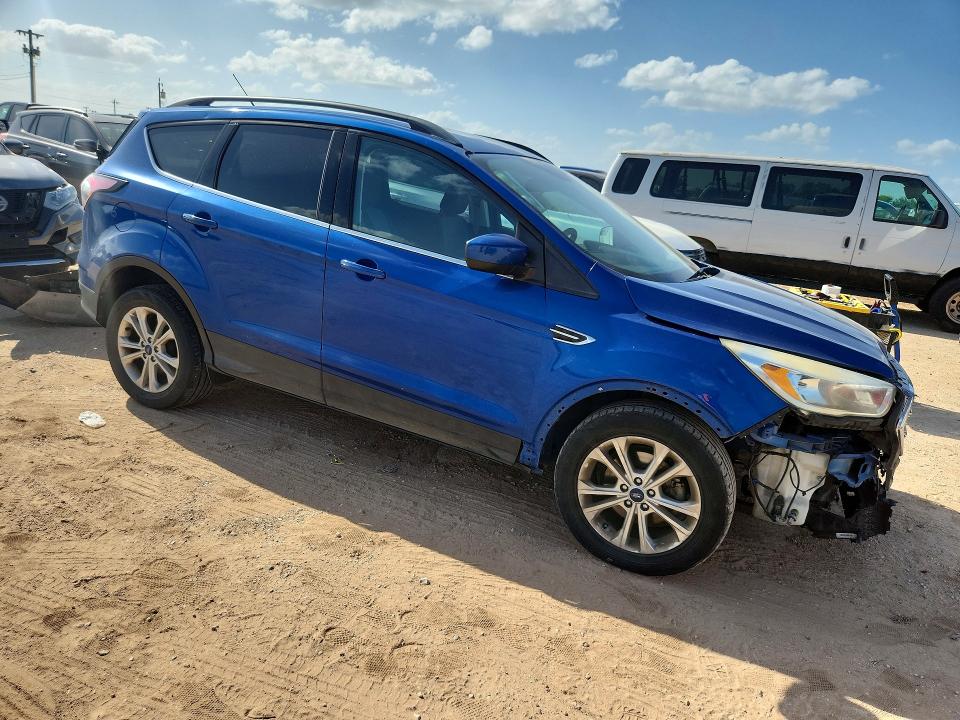 Photo 4 from auction – 2018 FORD ESCAPE with VIN 1FMCU0GD0JUA12021