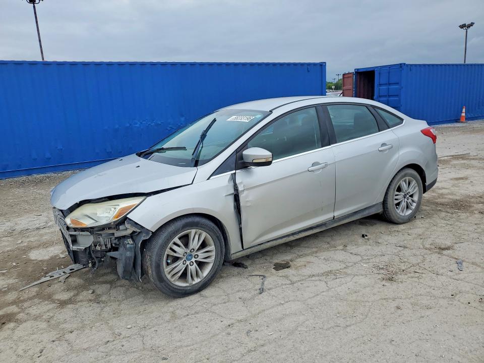 FORD FOCUS 2012 with VIN 1FAHP3H22CL338370 - Photo from auction