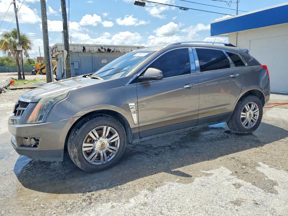 CADILLAC SRX 2012 with VIN 3GYFNAE36CS620556 - Photo from auction