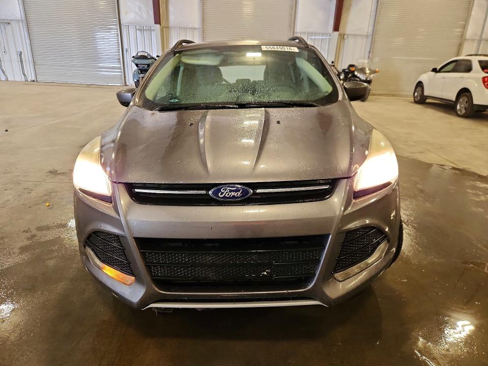 Photo 5 from auction – 2014 FORD ESCAPE with VIN 1FMCU9G99EUC30495