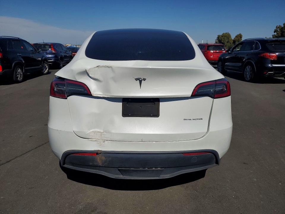 Photo 6 from auction – 2023 TESLA MODEL Y with VIN 7SAYGAEE2PF640637