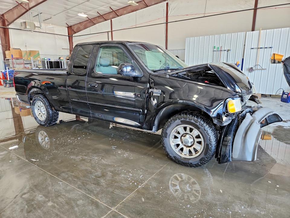 Photo 4 from auction – 2002 FORD F150 with VIN 2FTRX17WX2CA87078