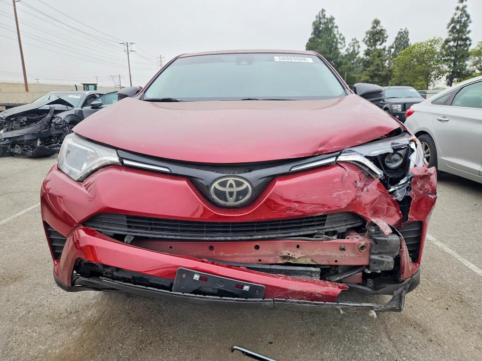 Photo 5 from auction – 2018 TOYOTA RAV4 with VIN 2T3ZFREV2JW494549
