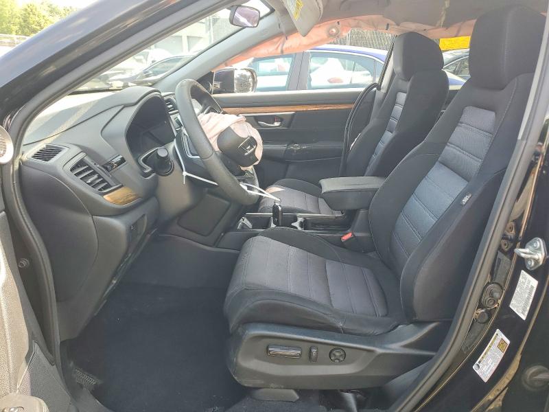 Photo 7 from auction – 2018 HONDA CR-V with VIN 7FARW1H54JE023624