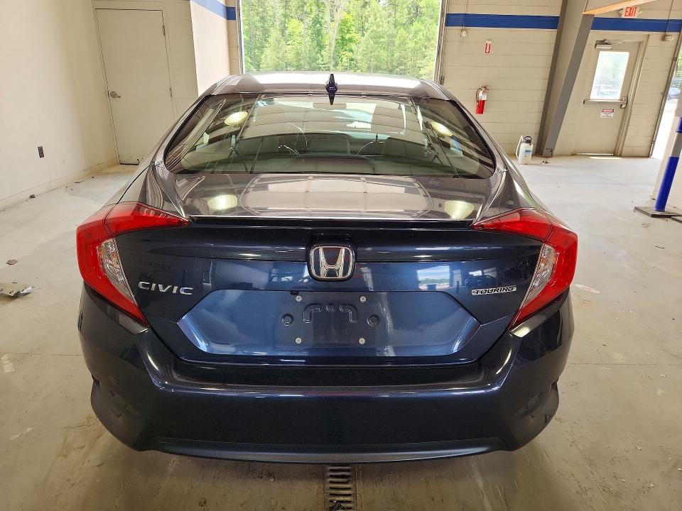 Photo 6 from auction – 2018 HONDA CIVIC with VIN JHMFC1F97JX008035
