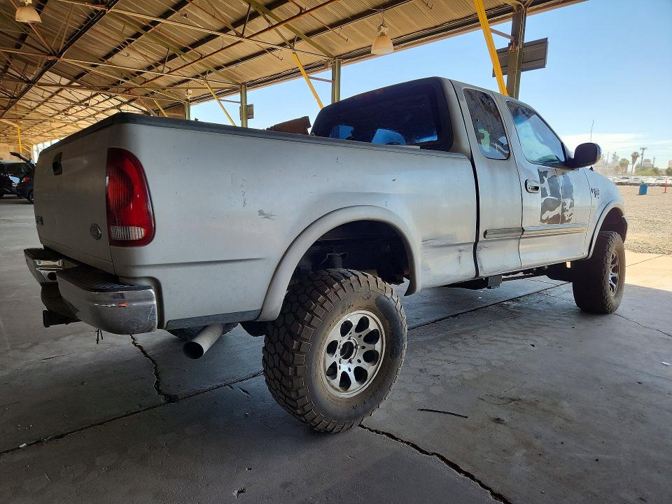 Photo 3 from auction – 2000 FORD F150 with VIN 2FTRX18L9YCB18575