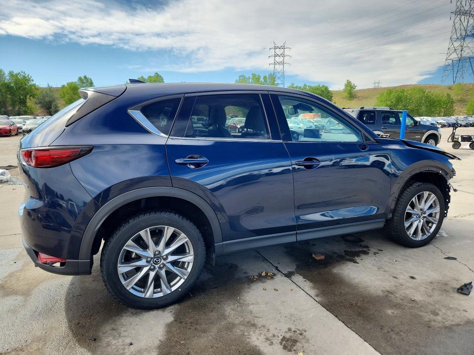 Photo 3 from auction – 2021 MAZDA CX-5 with VIN JM3KFADM0M1322994