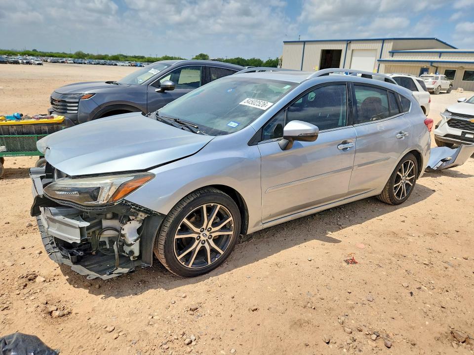 SUBARU IMPREZA 2017 with VIN 4S3GTAU67H3718410 - Photo from auction