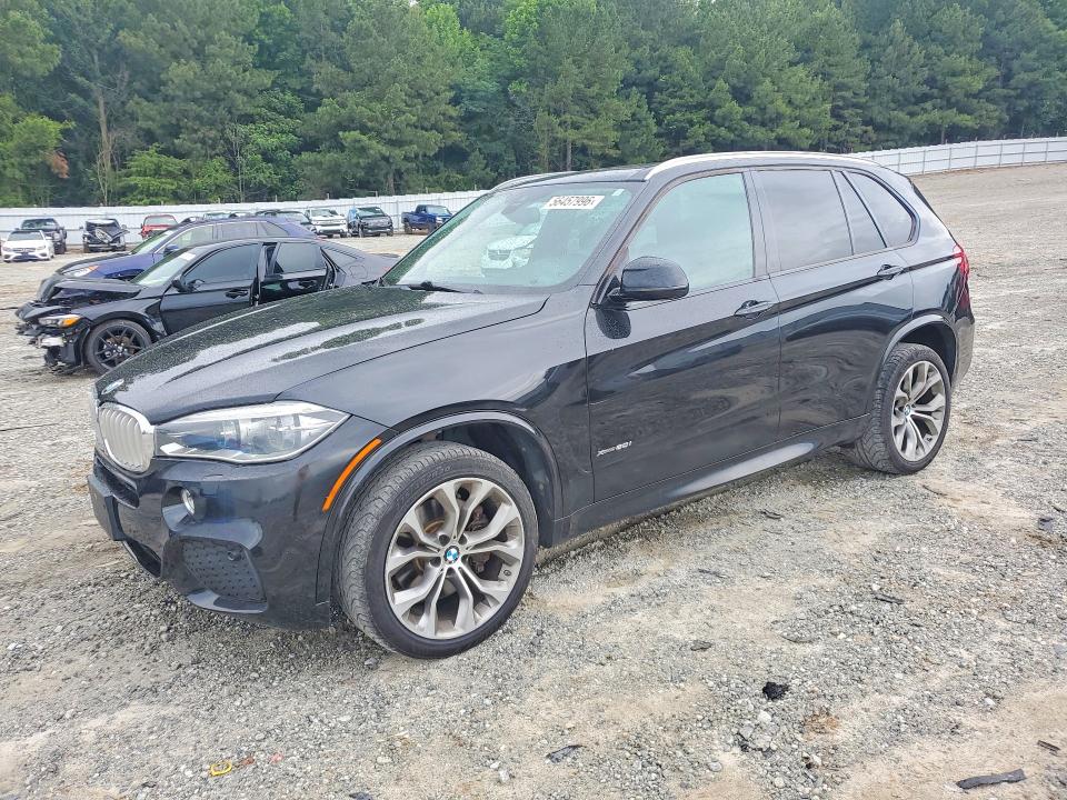 BMW X5 2014 with VIN 5UXKR6C52E0J72920 - Photo from auction