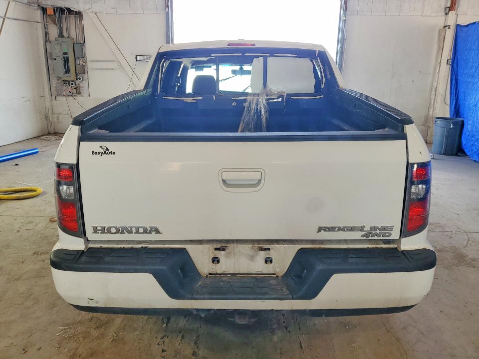 Photo 6 from auction – 2012 HONDA RIDGELINE with VIN 5FPYK1F57CB452854