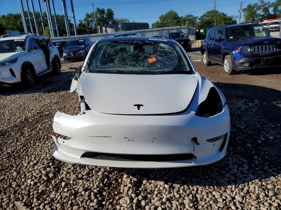 Photo 5 from auction – 2022 TESLA MODEL 3 with VIN 5YJ3E1EB0NF180541