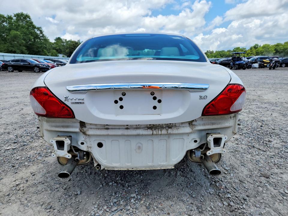 Photo 6 from auction – 2004 JAGUAR X-TYPE with VIN SAJEA51C84WD77899