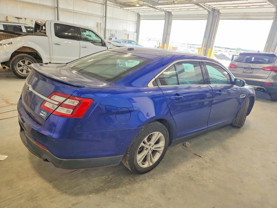 Photo 3 from auction – 2014 FORD TAURUS with VIN 1FAHP2H80EG104299