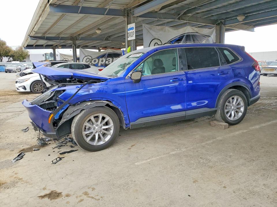 HONDA CR-V 2024 with VIN 2HKRS4H79RH413562 - Photo from auction
