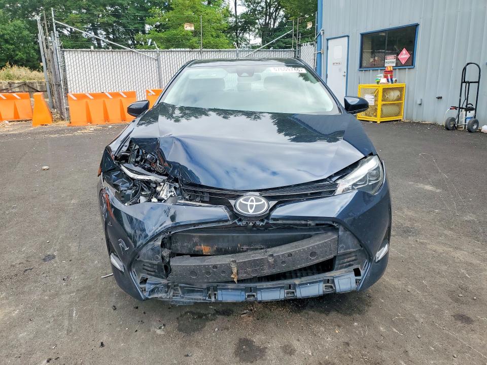 Photo 5 from auction – 2018 TOYOTA COROLLA with VIN 5YFBURHE4JP835768