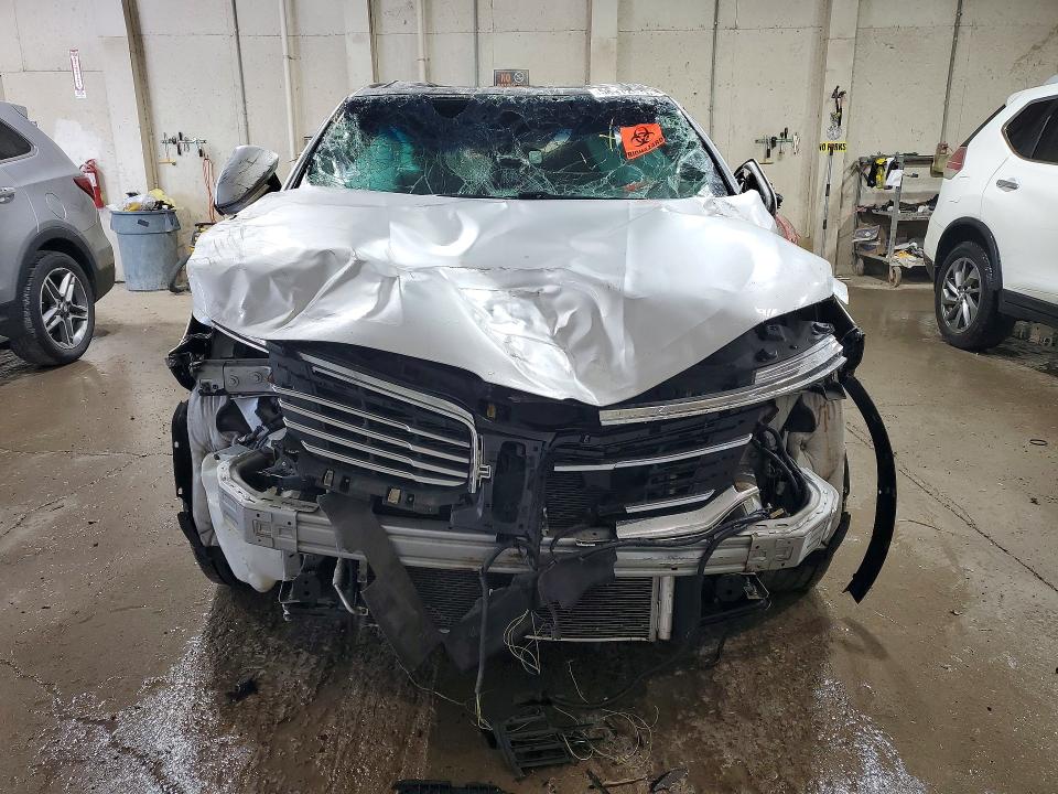 Photo 5 from auction – 2016 LINCOLN MKX with VIN 2LMTJ6KR8GBL37274