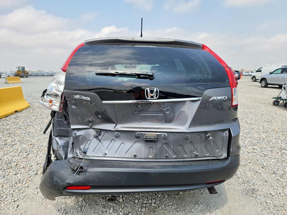 Photo 6 from auction – 2014 HONDA CR-V with VIN 2HKRM4H70EH629868