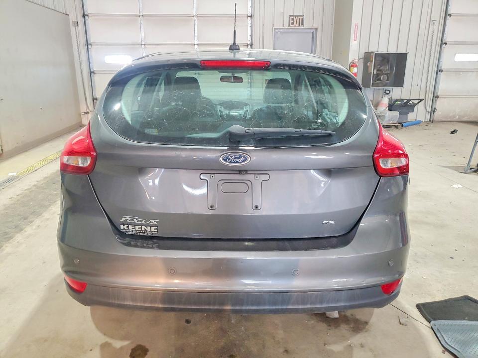 Photo 6 from auction – 2016 FORD FOCUS with VIN 1FADP3K28GL299572
