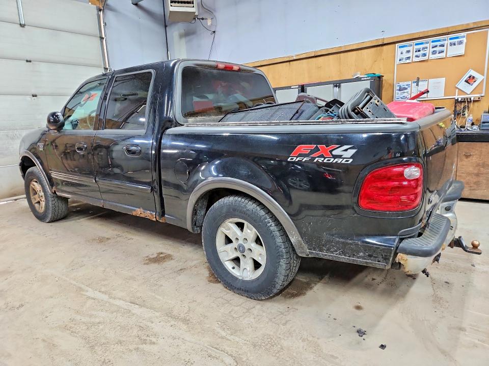 Photo 2 from auction – 2003 FORD F150 with VIN 1FTRW08L33KC56226