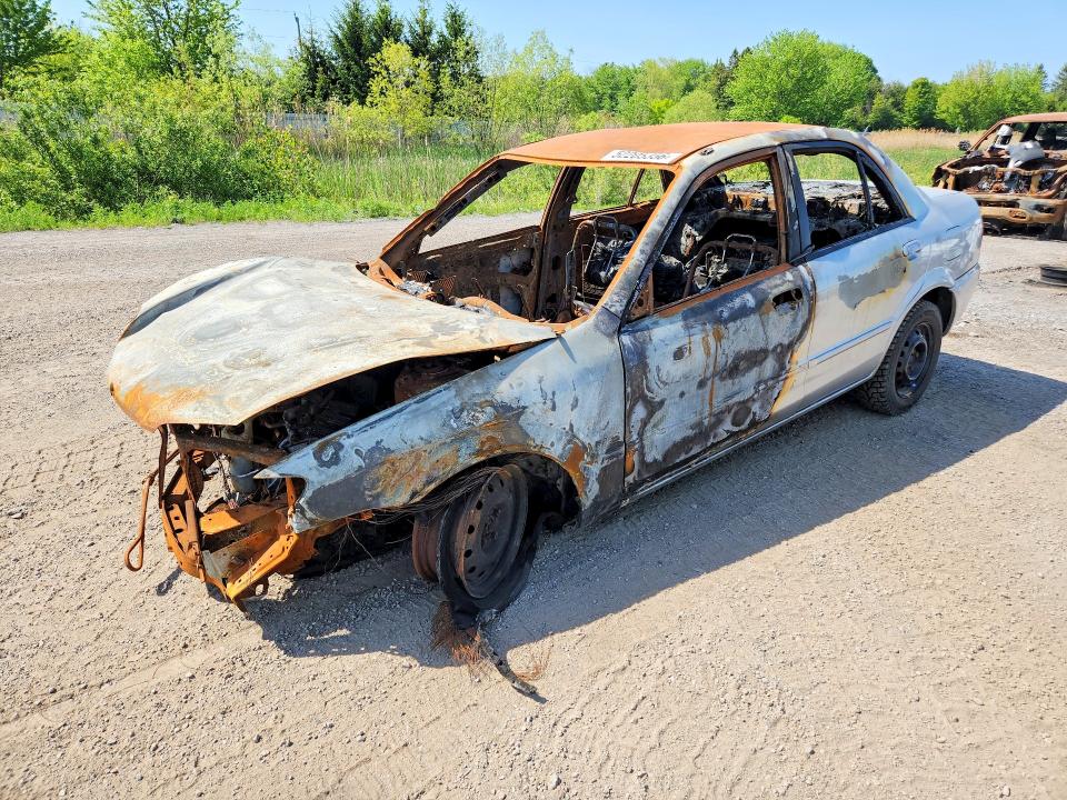 MAZDA PROTEGE 2002 with VIN JM1BJ225720536666 - Photo from auction