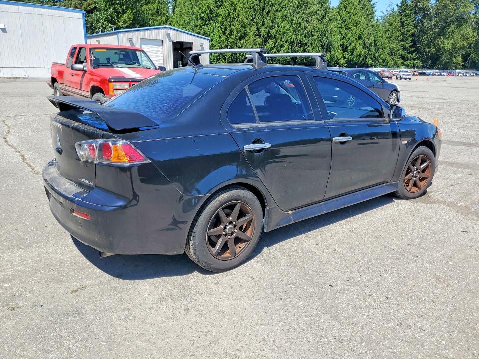 Photo 3 from auction – 2014 MITSUBISHI LANCER with VIN JA32V2FW8EU018729